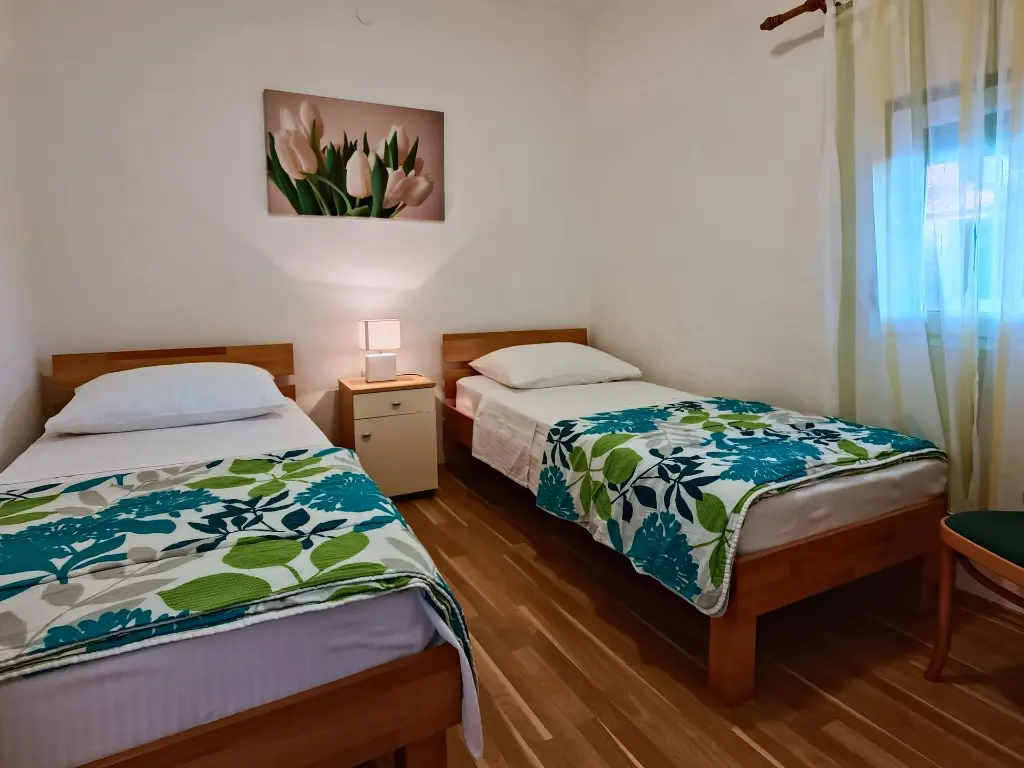 ELISE_06_Zweibettzimmer.webp